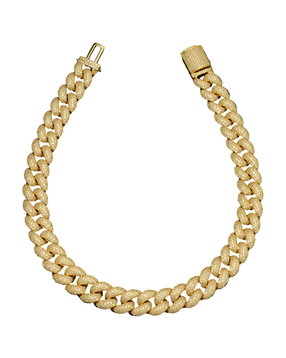 Gold iced Cuban link chain with pavé set stones and a box clasp