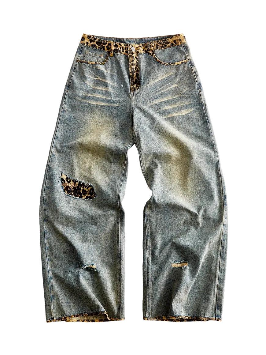 Light wash baggy jeans with leopard print waistband and knee blowout