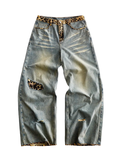 Light wash baggy jeans with leopard print waistband and knee blowout