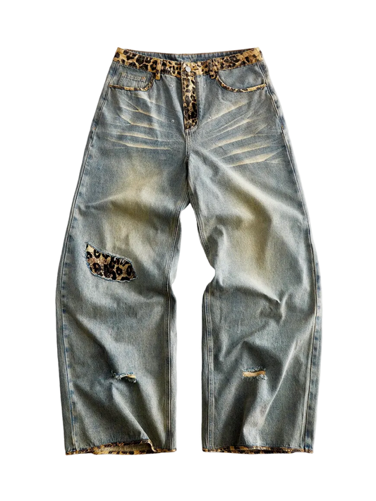 Light wash baggy jeans with leopard print waistband and knee blowout